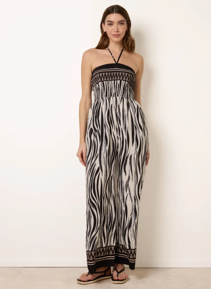 Blue Vanilla  Zebra Print Halter Neck Shirred Waist Jumpsuit for Women | Best Price UAE